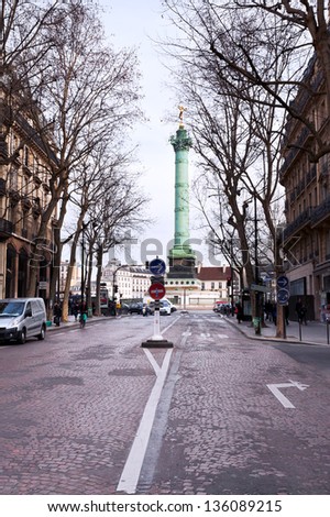 PARIS, FRANCE - MARCH 6: view of Place de la Bastille from rue Saint-Antoine in Paris on March 6, 2013. Its name comes from fact that it led to abbey of Saint-Antoine, converted into hospital in 1790