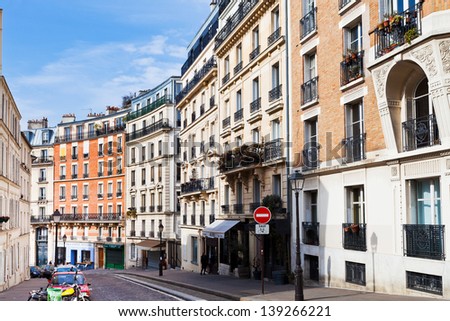 PARIS, FRANCE - MARCH 5: Rue Lepic in Montmartre district, Paris on March 5, 2013. Rue Lepic is an ancient road in the commune of Montmartre named again in 1864, after the General Louis Lepic.
