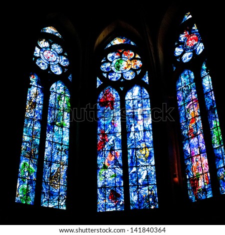 REIMS, FRANCE - JUNE 29: stained glass windows in Cathedral in Reims, France on June 29, 2010. Chapel stained glass windows were designed by Marc Chagall in 1974.