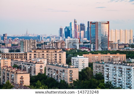 urban panorama with pink sunset in Moscow city