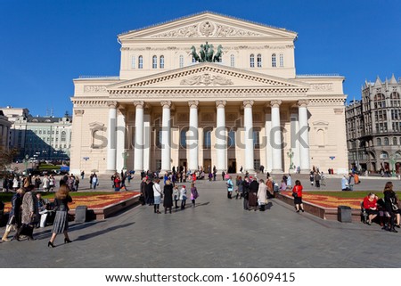 MOSCOW, RUSSIA - OCTOBER 13: tourists near Bolshoi Theater building in Moscow, Russia on October 13, 2013. The Theater new building was re-opened after an extensive six-year renovation 28 October 2011