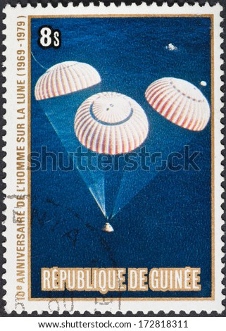 REPUBLIC OF GUINEA - CIRCA 1979: A postage stamp printed in the Republic of Guinea shows the Apollo 11 Moon Landing and first step on The Moon surface, circa 1979