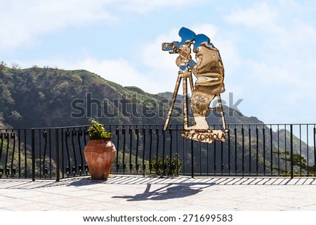 SAVOCA, ITALY - APRIL 4, 2015: Statue of Francis Ford Coppola created by Nino Ucchino - a Local Savoca artist\'s tribute to Francis Ford Coppola of the GODFATHER movies filmed in part here