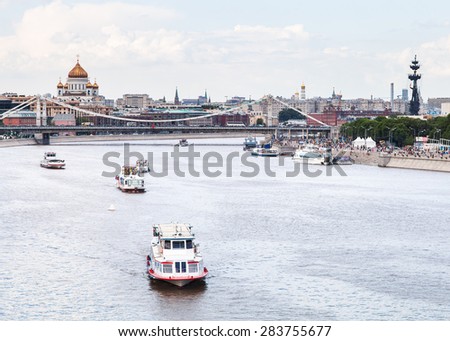 Krymsky Bridge and excursion ships on Moskva River, Moscow city, Russia