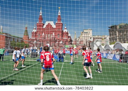 MOSCOW, RUSSIA - MAY 28: Volleyball game on Res Square on May 28, 2011 in Moscow, Russia. Different sport games during sport and military festival on Red Square - central square in Moscow.
