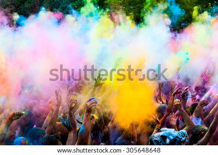 MADRID SPAIN -AUG 8: People celebrated Monsoon Holi Festival of Colors on August 8, 2015 in Madrid, Spain. People dancing and celebrating during the color throw.