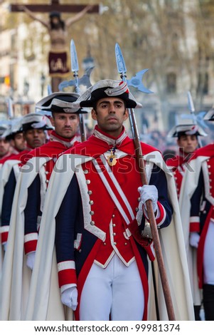 MADRID - APR 6: Soldiers in full uniform during Holy Week on April 6,2012 in Madrid, Spain. Procession Christ of the Alabarderos through the streets of Madrid in the festivities of Easter Holy Week