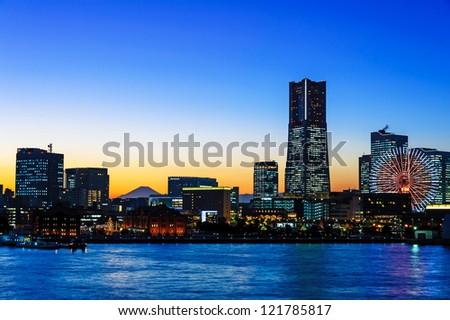 Yokohama City at twilight in Yokohama, Japan. It is a large urban development and the central business district of Yokohama, Japan.