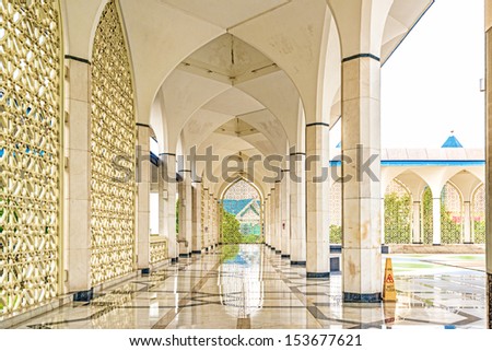 SHAH ALAM, MALAYSIA - AUGUST 15: The Hallway of Sultan Salahuddin Abdul Aziz Mosque in Shah Alam, Malaysia on August 15, 2013. The Mosque is also known as the Blue Mosque owing to its blue dome.