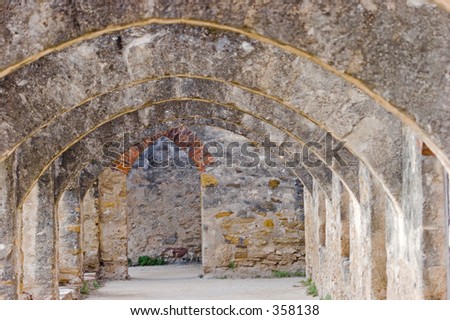 Mission arches, stone work over path