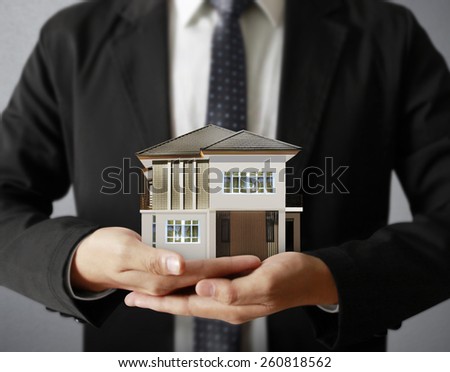 House model concept in the hand