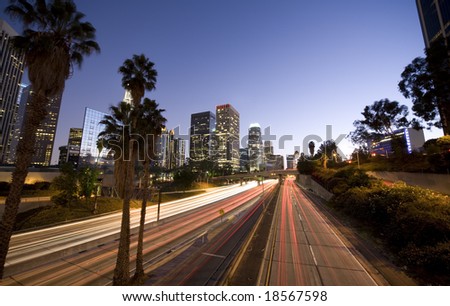 Similar – Image, Stock Photo Driving through Los Angeles in a convertible. LA, California.