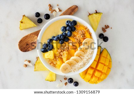 Similar – Image, Stock Photo Healthy breakfast. Bowl with cereals, raspberries and blueberries next to oranges