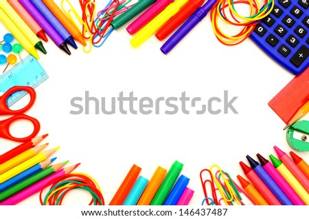 Colorful frame of school supplies over a white background
