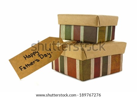 Fathers Day gifts with tag over a white background