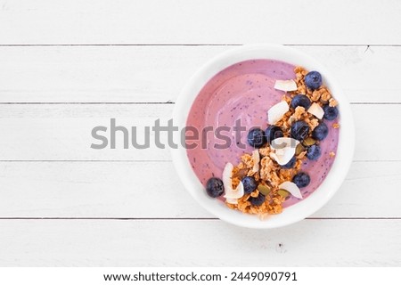 Similar – Image, Stock Photo Smoothie bowl with fresh berries and sesame served on table