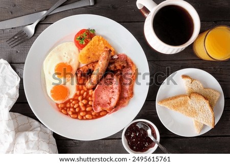 Similar – Image, Stock Photo Breakfast with egg, meat jamon, spinach and bread on terrace wooden table. Delicious homemade breakfast on balcony.