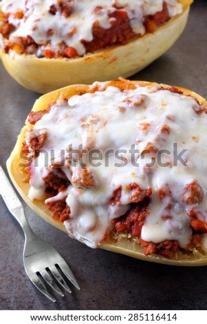 Close up of spaghetti squash baked with lean ground turkey, tomato sauce and melted mozzarella cheese