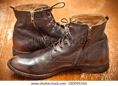 Leather shoes brown. Fashionable leather high boots. autumn - spring shoes. cowboy style. Aged leather boots. Vintage style