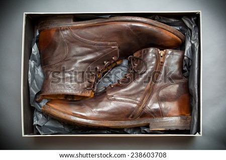New fashionable leather shoes. Gift box with a shoe