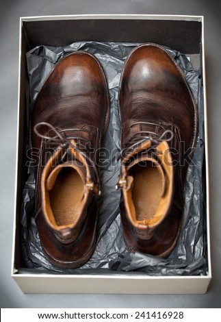 men\'s fashion leather shoes in a box from a store