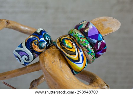 Decorative wooden bracelets on the wrists. piece handmade accessories