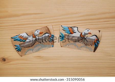 Wooden combs for combing hair. Wooden combs painted flying ducks, handmade.