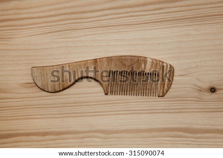 Comb wooden top view. Eco-Friendly material