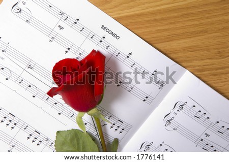 Sheet music with rose piano