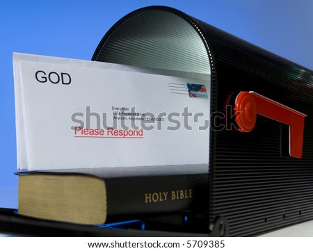 Mail box containing Holy Bible on white background, symbolizing that the Bible is a message or mail from God