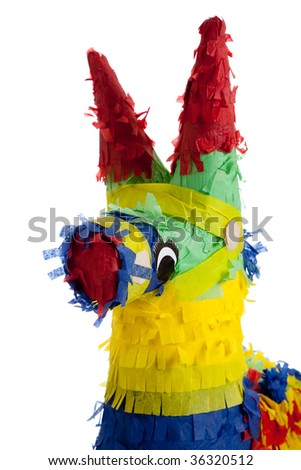 A traditional, primary colored Mexican party pinata on a white background