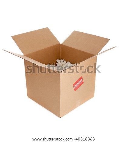 a brown corrugated cardboard box with a fragile sticker on it with packing peanuts in it