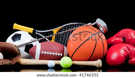 Assorted sports equipment including a basketball, soccer ball, tennis ball, golf ball, bat tennis racket, boxing gloves, football, golf and baseball glove