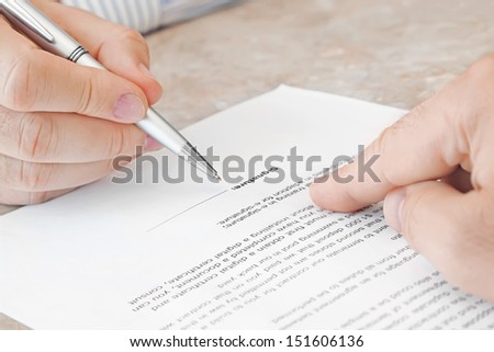 Signing a Document in the Office