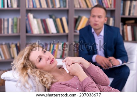 Depressed woman talking to her psychologist