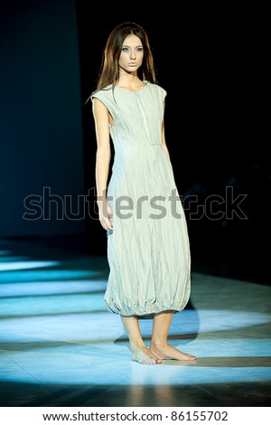 KIEV, UKRAINE - OCTOBER 17: Fashion model wears clothes created by \