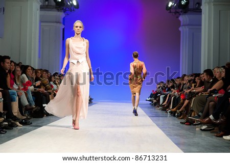 KIEV, UKRAINE - OCTOBER 14: Fashion models wear clothes created by \
