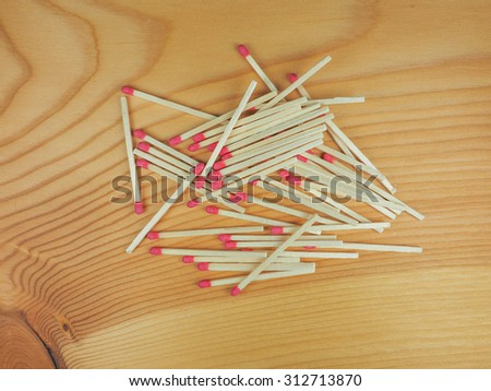 Matches for lighting fire on a wooden table