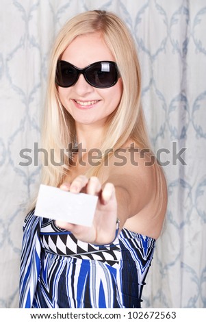 Lovely blond lady with a visit card
