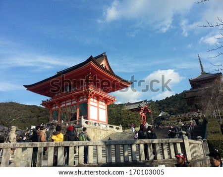KYOTO, JAPAN - DECEMBER 30, 2013: Tourists visit Koyomizu temple, a famous tourist attraction, in Kyoto.  The temple was built in year 778 without using any nails.