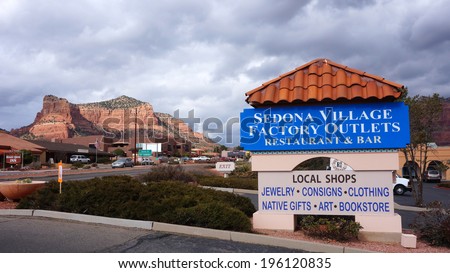 SEDONA, ARIZONA - FEBRUARY 04, 2014: Visitors enjoy the local merchants offering everything from local music to Native American Arts in Sedona Village Factory Outlets.