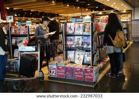 HONG KONG- NOVEMBER 22: Customers shop for books on 23 Novemer 2014 in Hong Kong Airport. Hong Kong airport provides the best shopping experience to the passengers.