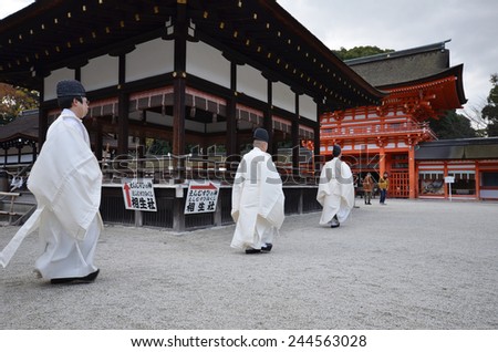 KYOTO, JAPAN - DEC 09: Shinto priests prepare for the praying ceremony in Shimogamo Shrine in Kyoto, Japan on December 09, 2014. Shimogamo Shrine is one of the oldest shrines in Japan.