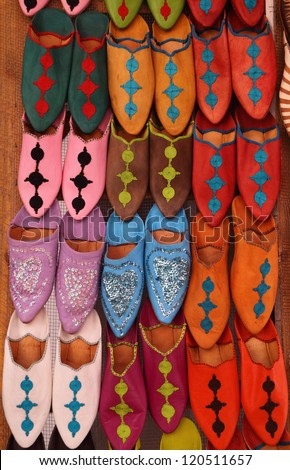Morocco, Marrakesh, Typical colorful \'babuchas\' - hand crafted leather slippers on display in the Medina souk
