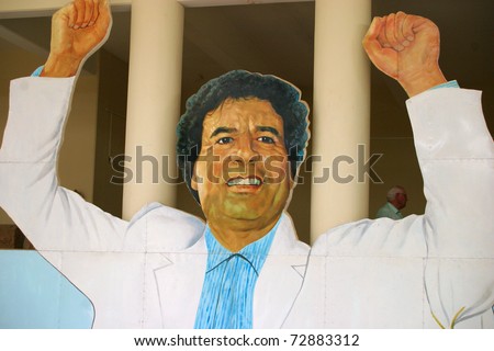 TRIPOLI - OCTOBER 12: In the belief that he is loved by his people, Moammar Gaddafi the autocratic Libyan leader has huge images of himself erected throughout Tripoli on October 12, 2005 in TRIPOLI LIBYA