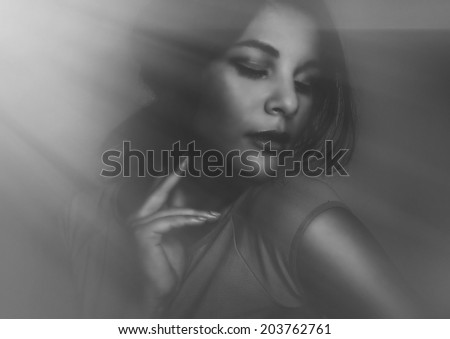 Beautiful young woman eyes closed head turned to side