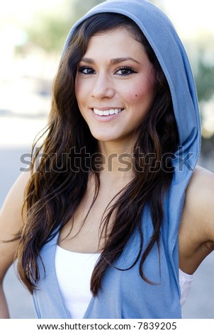 Young beautiful vibrant woman with pretty white smile