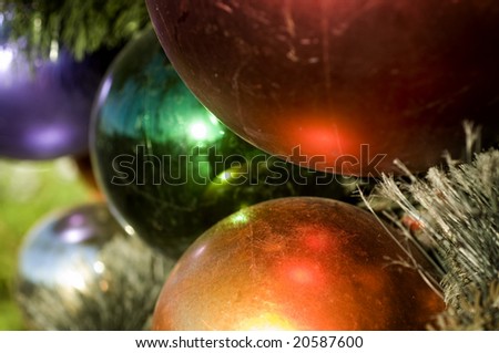 Christmas holiday decorations hanging from tree