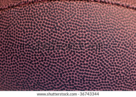American football texture background with clearly defined bumps and curve shape of ball.