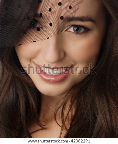 Attractive young woman wearing hair net vail
